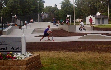 skatepark young child on scooter