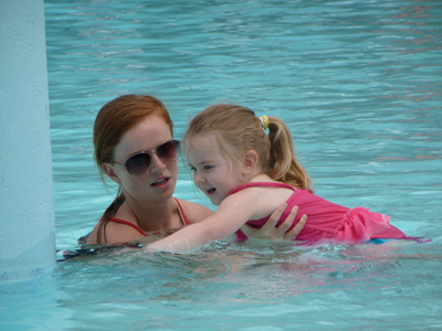 woman and young girl swimming