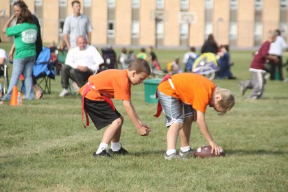 kid preparing to hike football