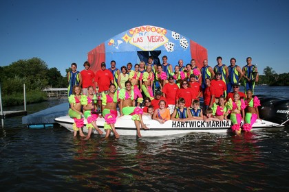 water skiers on boat