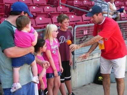 mc talking to kids at baseball game