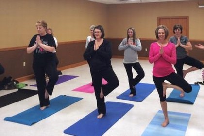 women doing yoga pose