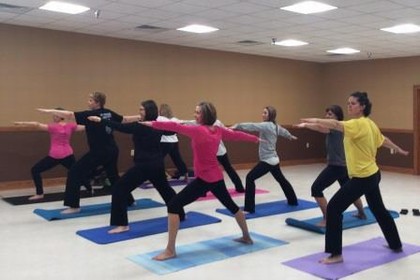 women doing yoga pose