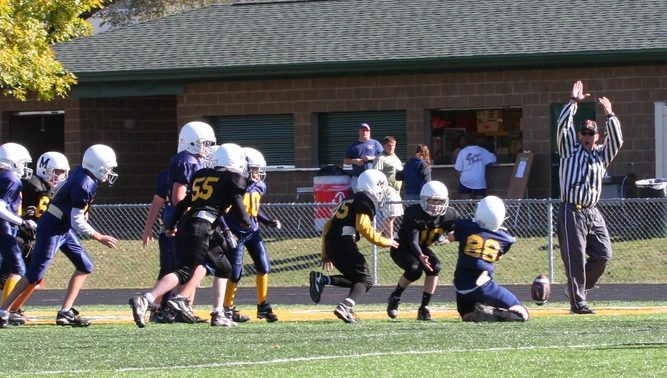 kids playing football